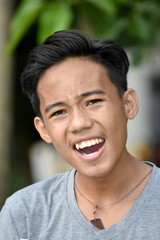 A Filipino Youth Laughing