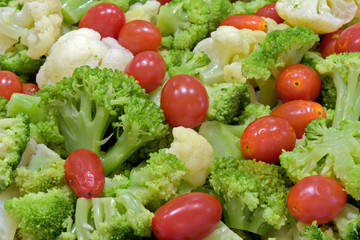 Closeup of broccoli and tomato salad platter
