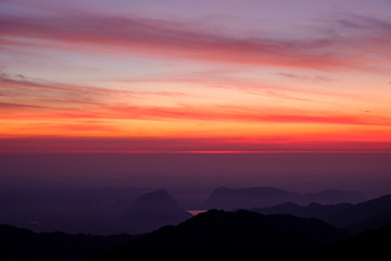 Fototapeta premium Twilight light pink and purple colors beautifully. reflect the views Mountains and fog in the morning. Khao Jed Yod, Trang in Thailand.