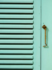 green wood window with hook texture