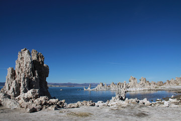 Tufa towers at Mono Lake in California against a clear blue sky