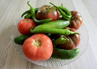 Fresh organic vegetables in glass bowl