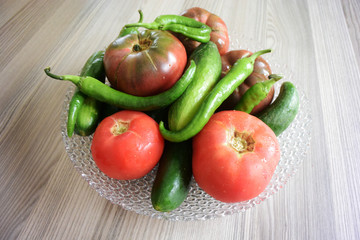 Fototapeta na wymiar Fresh organic vegetables in glass bowl