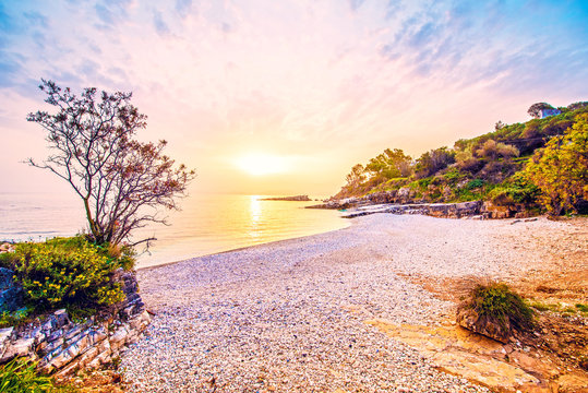Fabulous beautiful magic dawn on Bataria Beach on the coast of the Ionian Sea in Corfu (Керкіра), Greece. Amazing places. Tourist Attractions.
