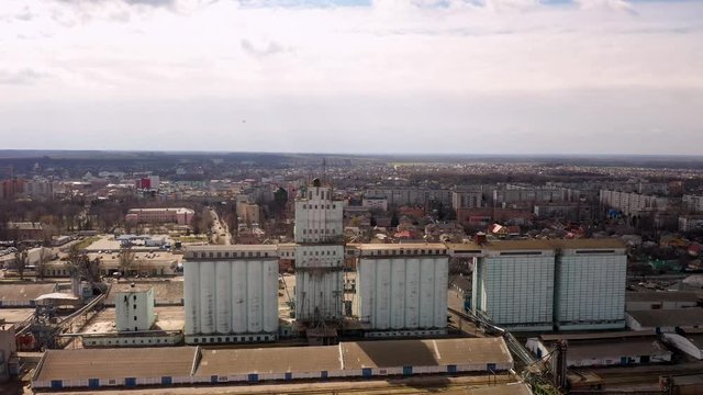 Aerial of a large building in Uman's industrial area. 4k drone