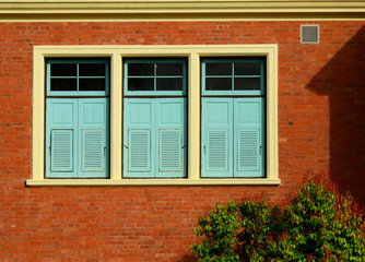 wood window on brick wall