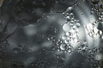 abstract background .Stainless steel sink splashed with water