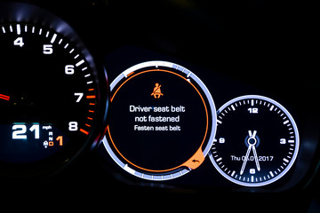 Modern light car mileage on black background