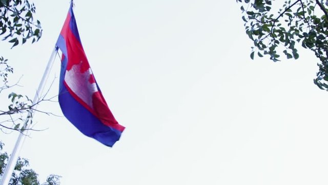 A panning shot of cambodia flag waving