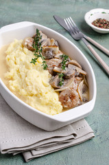 Mashed potatoes and slices of mushrooms