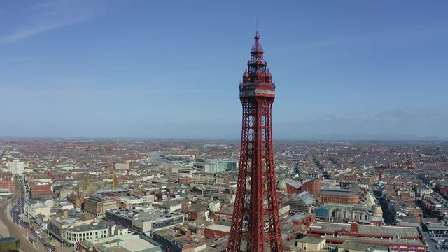 Stunning aerial view, footage of Blackpool Tower  from the sea of the award winning Blackpool beach, A very popular seaside tourist location in England , United Kingdom, UK