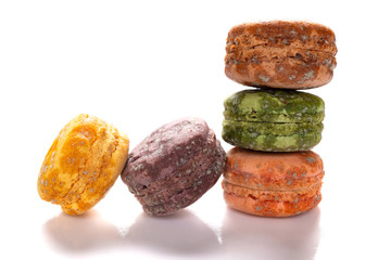 5 pcs moldy macaroons on a white background close up