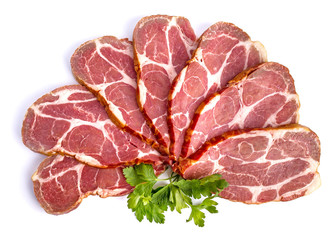 A few pieces of smoked meat with parsley
