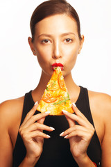 Food seduction concept. Fashionable femme fatal eating traditional italian pizza Margarita isolated...