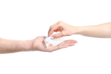 Hand give wet wipe to hand on white background isolation