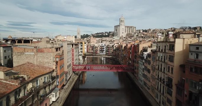aerial image of Girona river with eiffel bridge and seagulls