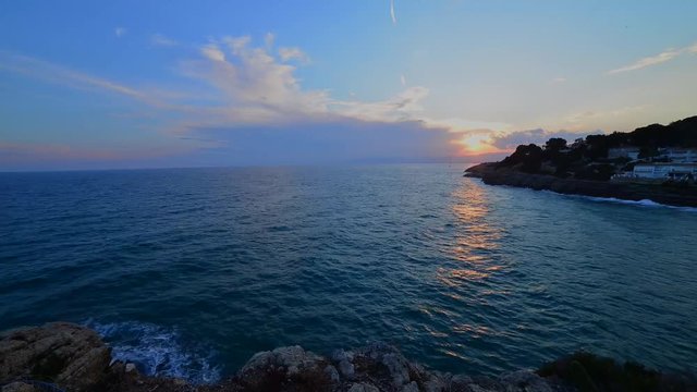 A time lapse from a lookout on the side of Cala Cranc in the city of Salou,Catalonia,Spain