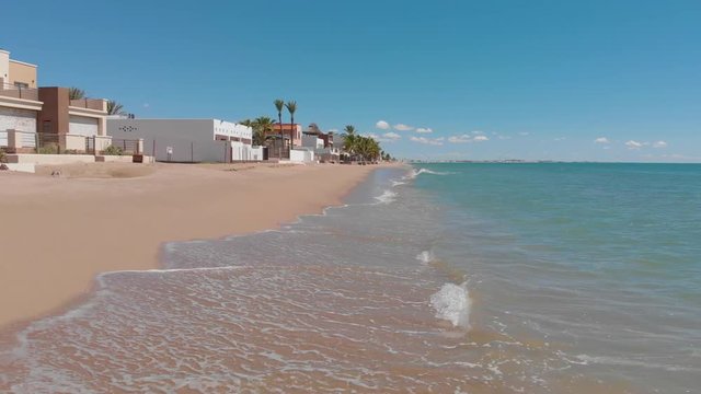 Aerial drone footage of kino bay in Hermosillo Sonora Mexico during sunny day - close to the ground