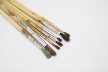 Obraz premium Paint brushes and paints for drawing isolated on white background