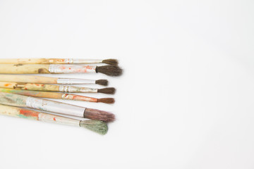 Fototapeta premium Paint brushes and paints for drawing isolated on white background