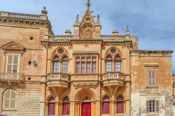 Facade of the house with maltese balconies  in Mdina, Malta