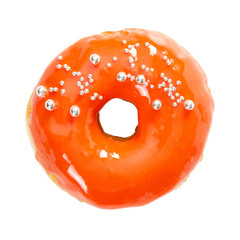 Donut with yellow glossy mirror glaze isolated on white