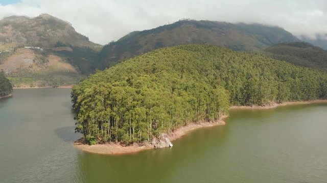 Aerial view beautiful nature with mountains and hills by Lake Mattupetty. Kerala State. Near the city of Munar.