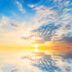 Fototapeta premium Background sky during sunset and water reflections.