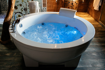 Modern beautiful hydro massage bath with water
