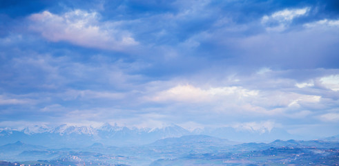 Mountain landscape under blue clouds