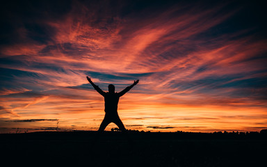Man jumping in the beautiful sunset