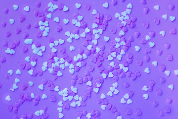 Violet neon background with white and violet little hearts.