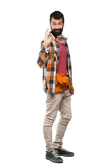 Naklejka premium Craftsmen man showing ok sign with fingers over isolated white background
