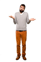 Handsome man making doubts gesture over isolated white background