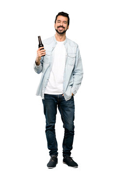 Handsome Man With Beard  Drinking Beer.