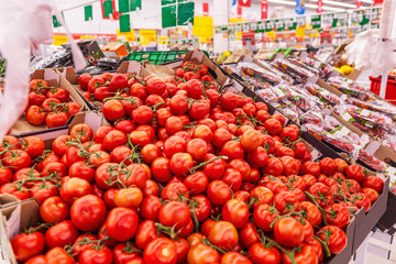 Tomatoes on the counter in the supermarket