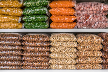 store counter with nuts and dried fruit. sweets in the market.