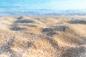 Fototapeta na wymiar background image of sandy beach and ocean waves
