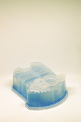 Men shaver cleaning solution cartridge on white isolated background