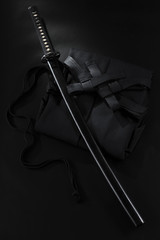 Japanese katana samurai sword. Aikido hakama, martial arts uniform © Vladimir