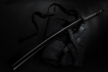 Japanese katana samurai sword. Aikido hakama, martial arts uniform © Vladimir