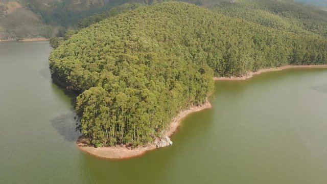 Aerial view beautiful nature with mountains and hills by Lake Mattupetty. Kerala State. Near the city of Munar.