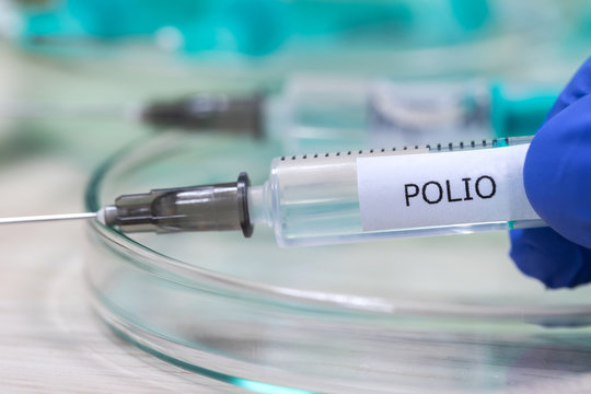 polio vaccination syringe background