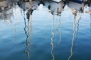 Background with boats reflection in Adriatic Sea Pula Croatia.