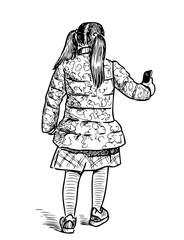 A little girl with a cell phone goes on a stroll