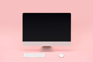 workplace with computer monitor, keyboard and computer mouse on pink background