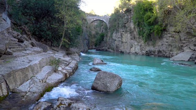 Antalya, Turkey - March 2019: Antique Oluk Bridge across Kopru Irmagi creek in Koprulu Kanyon national park in Antalya Turkey.