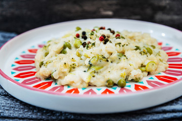 Risotto with broccoli, peas and lips