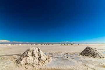 Piles of salt at Salar de Uyuni, Bolivia
