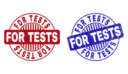 Grunge FOR TESTS round stamp seals isolated on a white background. Round seals with grunge texture in red and blue colors. Vector rubber imitation of FOR TESTS text inside circle form with stripes.